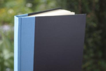 Writing and notebook black, with light blue linen